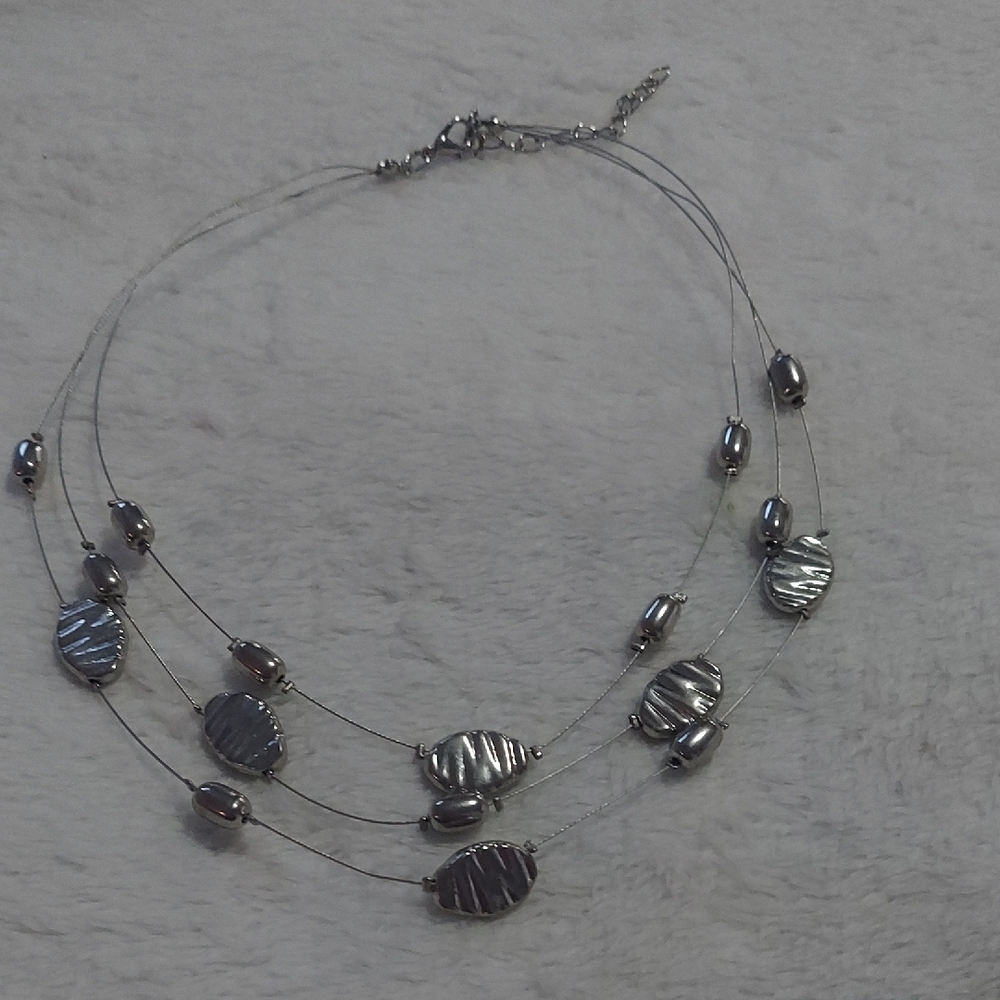 8/$10 Chic Multi-Layered Silver Necklace - Picture 3 of 4